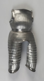 Breastplate with Tassets (Thigh Defenses), Germany, 1520-30 with some modern restoration. Creator: Unknown.