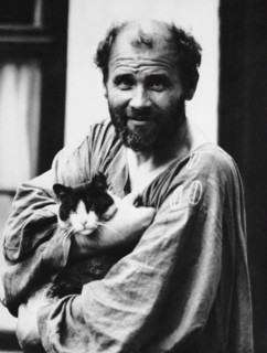 Gustav Klimt with a cat, 1911. Creator: Nähr, Moritz (1859-1945).