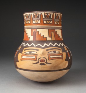Beaker Depicting a Human Head with Bound Lips and Geometric Motifs, 180 B.C./A.D. 500. Creator: Unknown.
