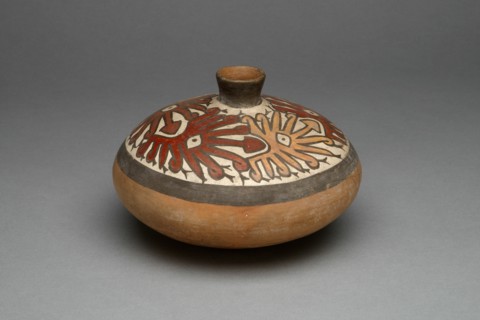 Low Jar with Small Spout Depicting a Repeated Abstract Star or Face Motif, 180 B.C./A.D. 500. Creator: Unknown.
