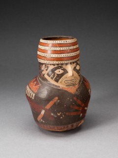 Jar in the Form of a Warrior Holding a Club and Other Weapons, 180 B.C./A.D. 500. Creator: Unknown.