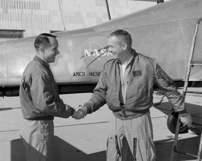 Fred Drinkwater congratulating Neil Armstrong, California, USA, February 1964.  Creator: Lee Jones.