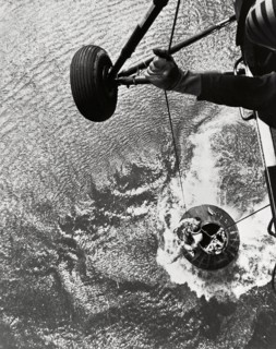 Shepard hoisted from Mercury capsule, 1961.  Creator: NASA.