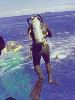 Navy diver leaps from helicopter, 1965. Creator: NASA.