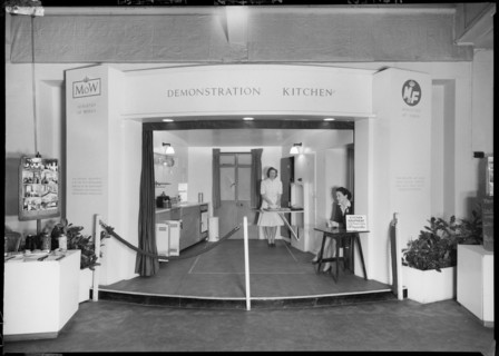 Two women in a demonstration kitchen, 1946. Creator: Ministry of Works.