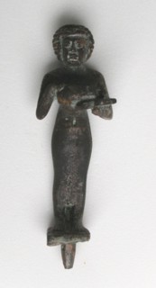 Statuette of a Priestess with Offering Table and Situla, Egypt, Third Intermediate Period, Dynasties Creator: Unknown.
