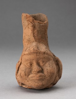 Heavily Eroded Miniature Jar in Form of a Human Head with Large Cheeks, 100 B.C./A.D. 500. Creator: Unknown.