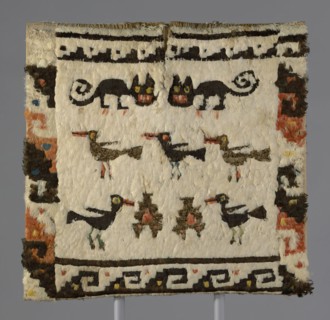 Feathered Tunic, Peru, 1470/1532. Cat and bird motif embellished with rare and valuable feathers from macaws, parrots, toucans, cotingas and tanagers from the tropical forests of South America, transp...