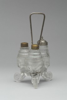 Jumbo/Elephant pattern cruet stand with three bottles, 1883/5. Attributed to Canton Glass Company.