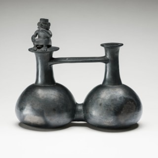 Double Vessel with a Seated Figure, A.D. 1200/1450.