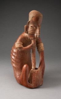 Seated Figure Drinking from a Vessel using a Tube, 200 B.C./A.D. 300.