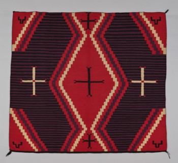 Chief Blanket (Third Phase), c. 1880. A work made of wool, dovetail tapestry weave with "lazy lines"; twined warp ends and selvages; corner tassels.