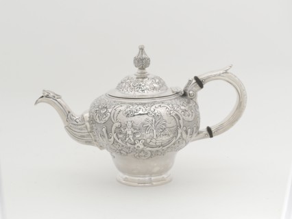 Teapot, 1848. Repoussé decoration, man carrying a yoke laden with baskets of produce.