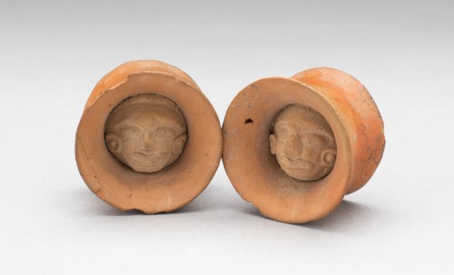 Pair of Earspools with Face in Interior, Possibly AD 450/1000.