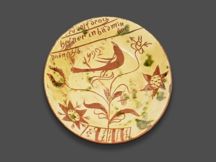 Plate, 1792. Sgraffito decoration, bird, tulip, and star shapes.
