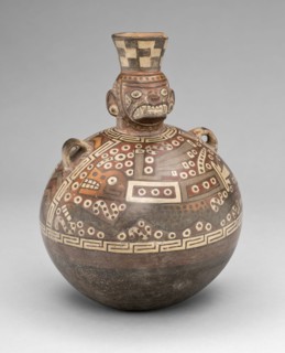 Bottle with a Masked Figure and Abstract Feline and Textile Motifs, A.D. 700/900.