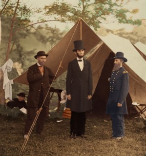 [President Abraham Lincoln, Major General John A. McClernand (right), and E. J. Allen (Allan Pinkerton, left), Chief of the Secret Service of the United States, at Secret Service Department, Headquart...