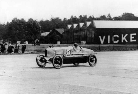 British racing driver George Bedford driving a Hillman at Brooklands, Surrey, 1921. Creator: Unknown.