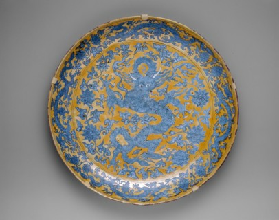 Large Plate with Dragons, Clouds and Floral Sprays, Ming dynasty (1368-1644), mark and reign of Jiajing (1522-66).