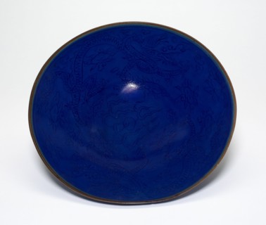 Low Bowl with Dragons amid Clouds Chasing Flaming Pearls, Ming dynasty (1368-1644).