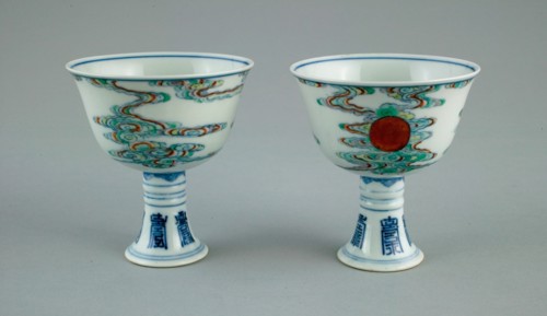 Pair of Stem Cups with Sun amid Clouds and Stylized Characters for 'Long Life' (Shou), Qing dynasty (1644-1911), Yongzheng reign mark and period (1723-1735).
