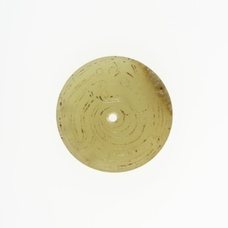 Disc with Coiled Dragon, Western Zhou period, 10th/9th century B.C.