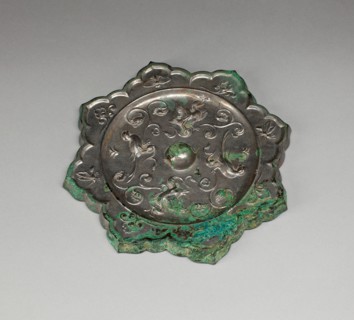 Lobed Mirror with Birds, Insects, and Floral Sprays, Tang dynasty (A.D. 618-907), 8th century.