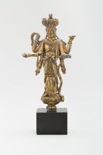 Eleven-Headed and Six-Armed Guanyin (Avalokiteshvara) Standing on a Lotus, Tang dynasty (618-907), c. 9th century.