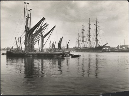 Sailing vessels at anchor on the River Medway below Rochester Bridge, Rochester, Medway, 1925-1935. Creator: J Dixon Scott.