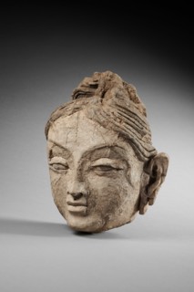 Head of a female. From Ajina Tepe, 7th-8th century. Creator: Central Asian Art.