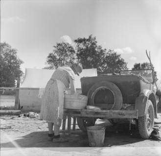 Blue Monday in a California migratory camp, 1936. Creator: Dorothea Lange.