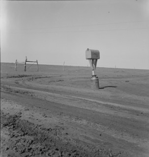 Mailbox in Dust Bowl, Coldwater District, north of Dalhart, Texas, 1938. Creator: Dorothea Lange.