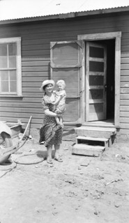 Typical Teutonic farm wife and child of Mills, New Mexico, area, 1935. Creator: Dorothea Lange.