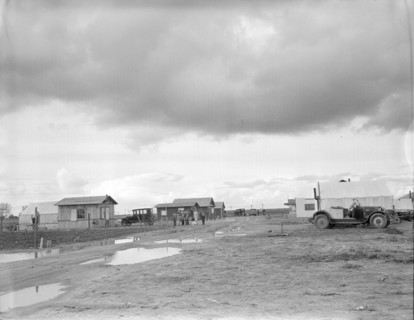 Street and homes in "Little Oklahoma", California, 1936. Creator: Dorothea Lange.