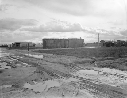 Freightcar converted into home in "Little Oklahoma", California, 1936. Creator: Dorothea Lange.