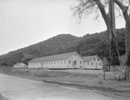 Dining hall, kitchen and hospital, Hot Springs federal shelter, California, 1936. Creator: Dorothea Lange.