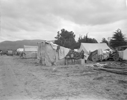Camps of migrant pea workers, California, 1936. Creator: Dorothea Lange.