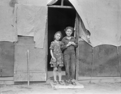 Migrant family in Kern County, California, 1936. Creator: Dorothea Lange.
