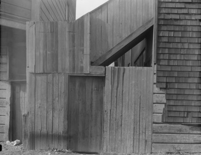 Mission District firetrap, San Francisco, California, 1936. Creator: Dorothea Lange.