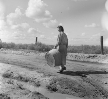 In a migratory labor camp, California, 1936. Creator: Dorothea Lange.