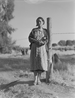 Pregnant migrant woman living in California squatter camp, Kern County, 1936. Creator: Dorothea Lange.