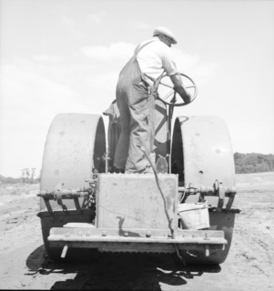 Building the road to the community factory, Hightstown, New Jersey, 1936. Creator: Dorothea Lange.