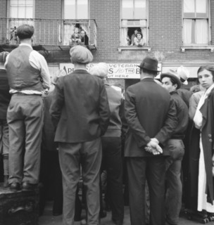 Crowds around post office, Lower East Side, New York, 1936. Creator: Dorothea Lange.