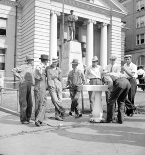 Saturday afternoon in front of the courthouse, Greenville [i.e., Greeneville], Tennessee, 1936. Creator: Dorothea Lange.
