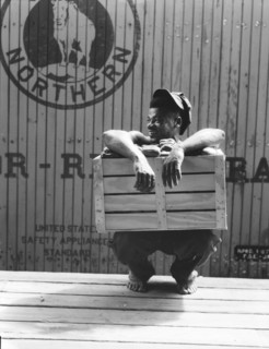 Migrant shed worker, Northeast Florida, 1936. Creator: Dorothea Lange.