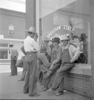 Farmers, Main street in Oklahoma town - Drought region, 1936. Creator: Dorothea Lange.
