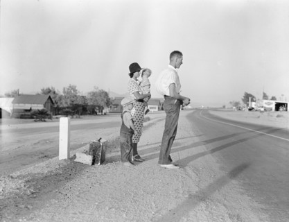 Oklahoma farm family on highway between Blythe and Indio - self-resettlement in California, 1936. Creator: Dorothea Lange.