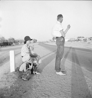 Oklahoma farm family on highway between Blythe and Indio - self-resettlement in California., 1936. Creator: Dorothea Lange.