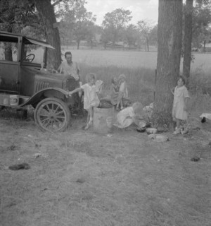 Migrant family from Oklahoma in Texas, 1936. Creator: Dorothea Lange.