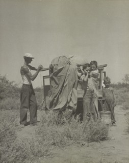 A tubercular painter from Iowa and part of his family... penniless in New Mexico, 1937. Creator: Dorothea Lange.